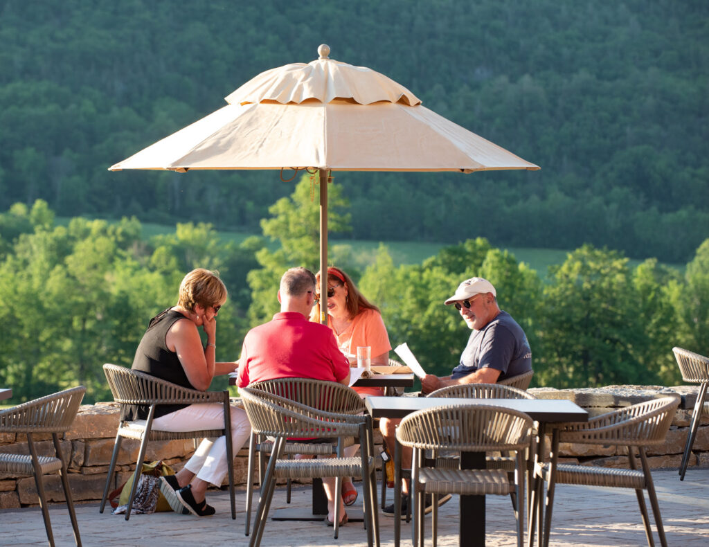 people dining outside on patio